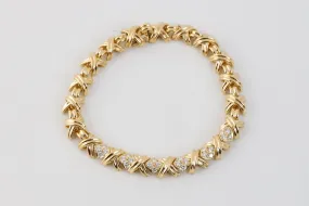 7 Tiffany & Co. 18k Yellow Gold Diamond Signature X Link Bracelet (29.19g.)