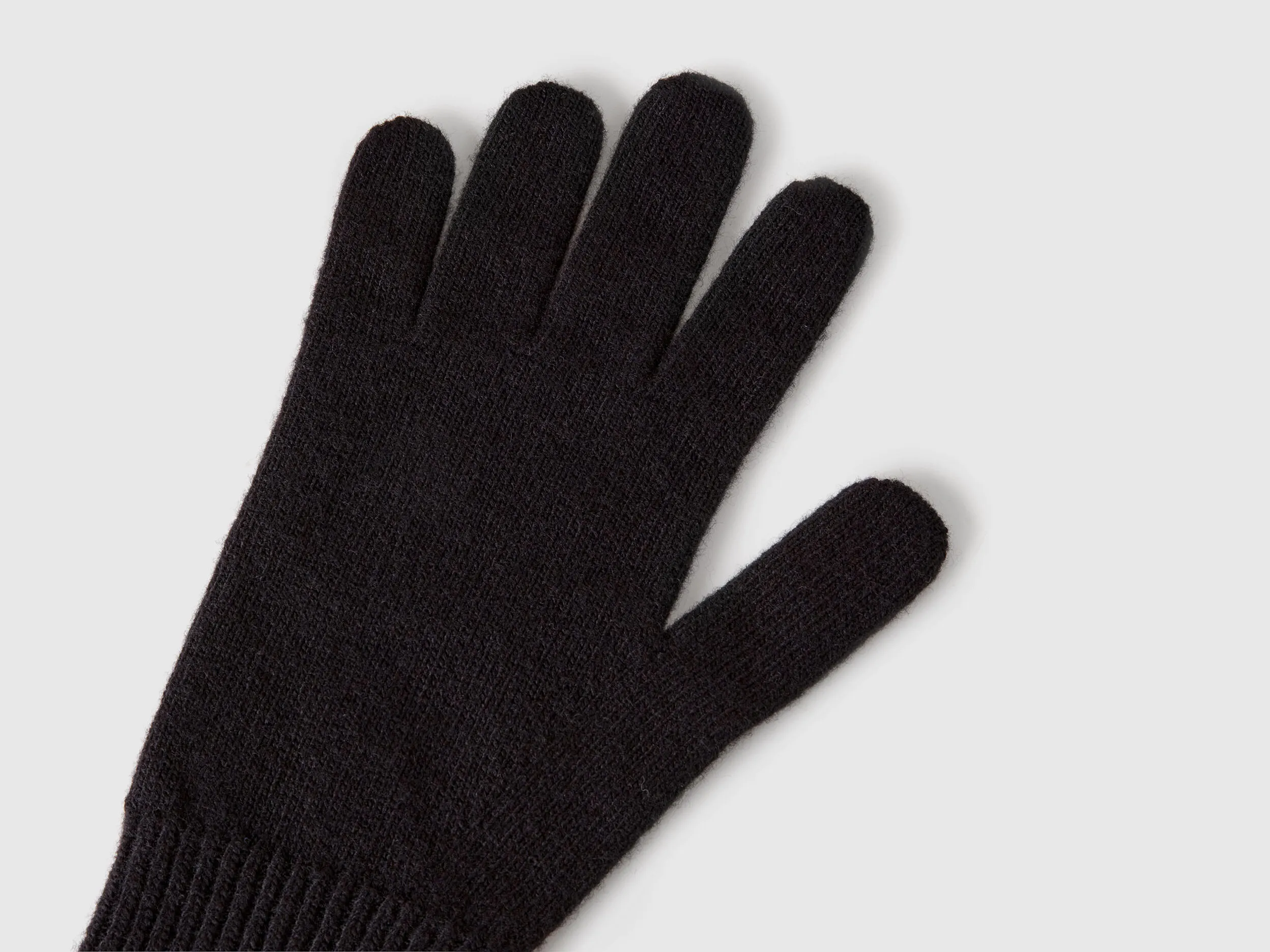 Gloves in pure Merino wool - Black | Benetton