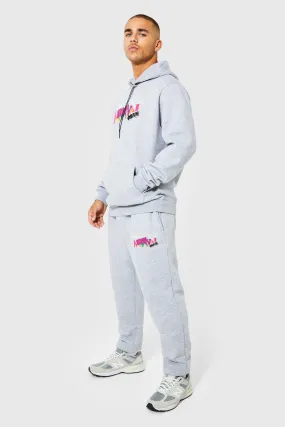 Man Hooded Tracksuit With Toggles