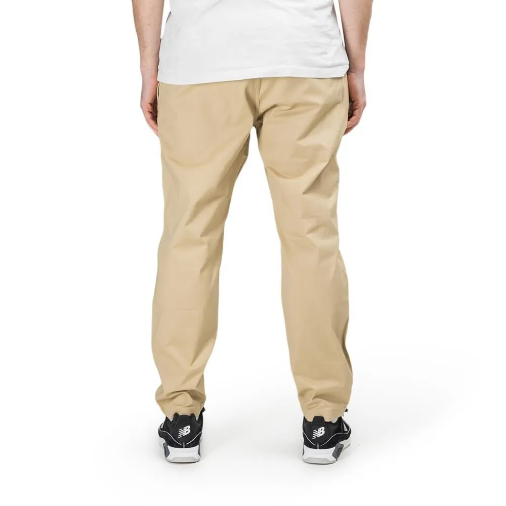 New Balance MP01504 INC Athletics Woven Pant (Beige)