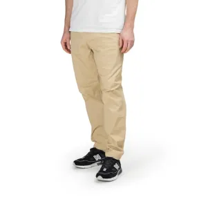 New Balance MP01504 INC Athletics Woven Pant (Beige)