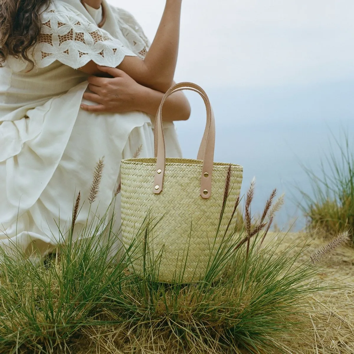 palm and natural leather basket bag