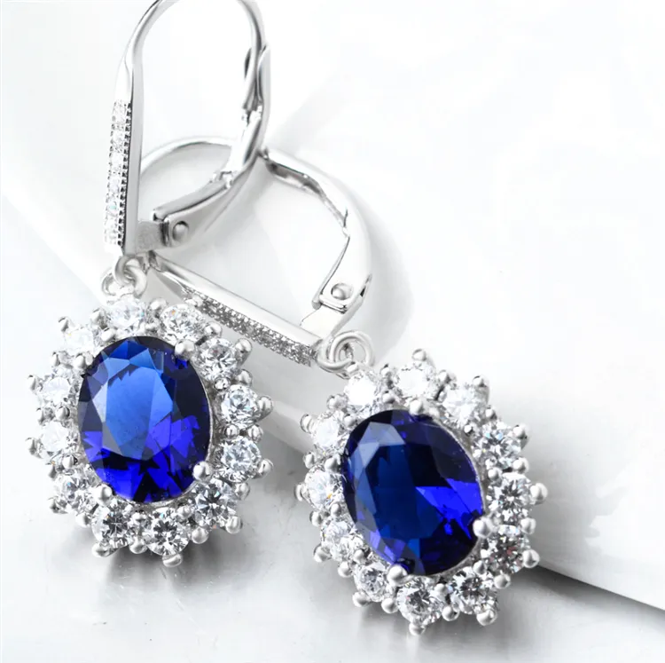 Sapphire Halo Leverback Earrings in 18K White Gold