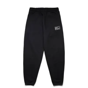 X STUSSY STONEWASHED BLACK TRACKSUIT BOTTOMS [DN4030-010] | Bodega