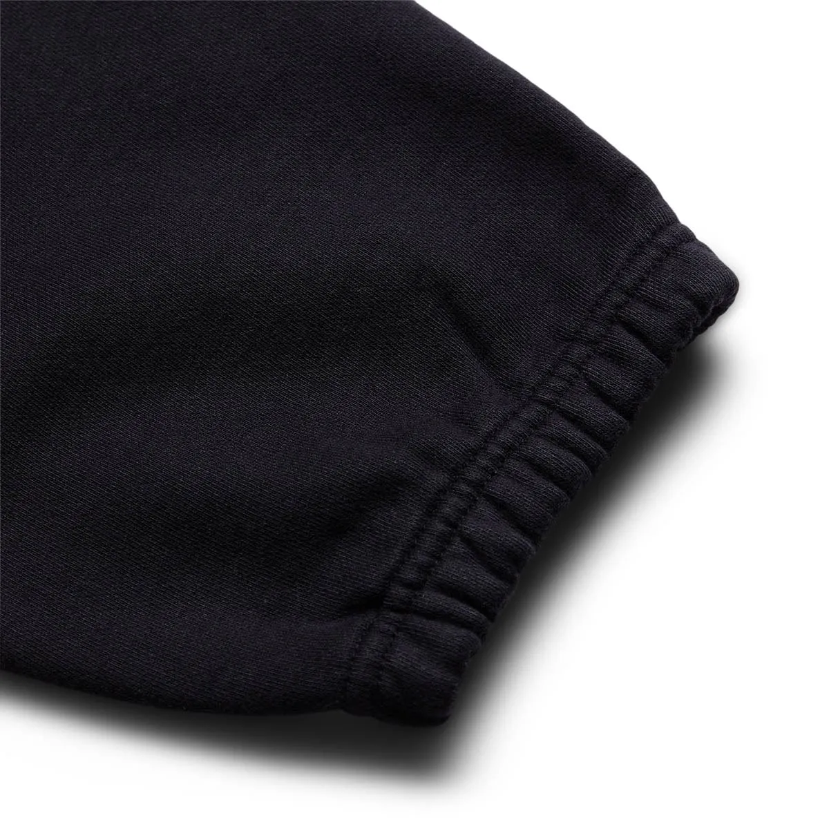 X STUSSY STONEWASHED BLACK TRACKSUIT BOTTOMS [DN4030-010] | Bodega